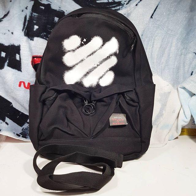 off white spray backpack