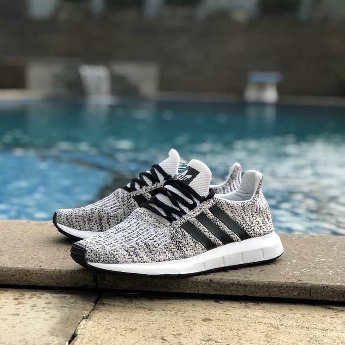 purple adidas swift run