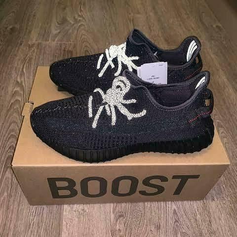 black yeezys reflective
