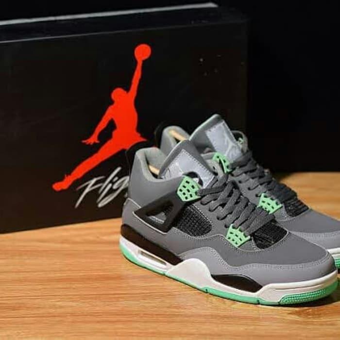black grey and green jordan 4