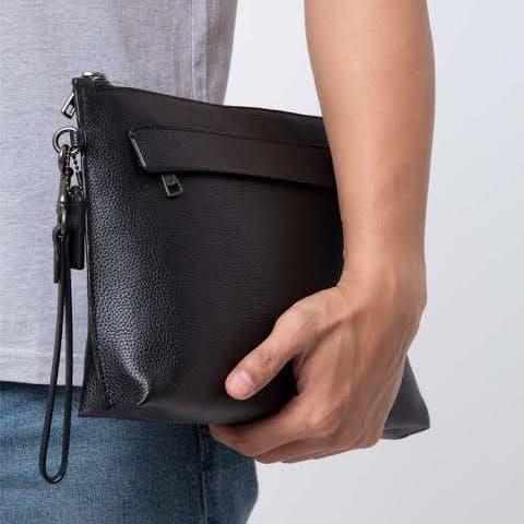 coach carryall pouch